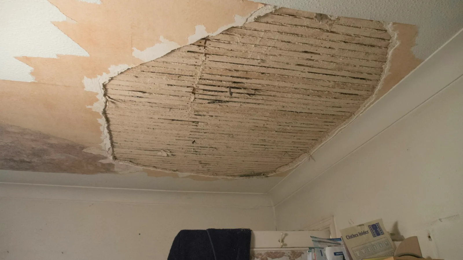 Does homeowners insurance cover water damage like this ceiling, torn open by a leak from above